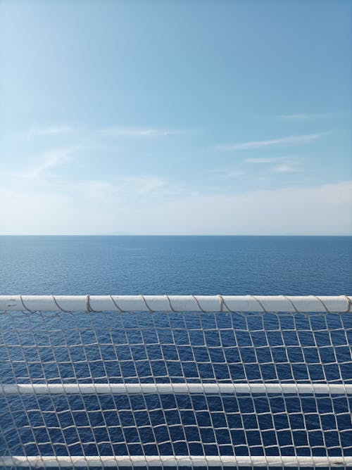Staircase with Metal Railings on a Building Near the Sea · Free Stock Photo