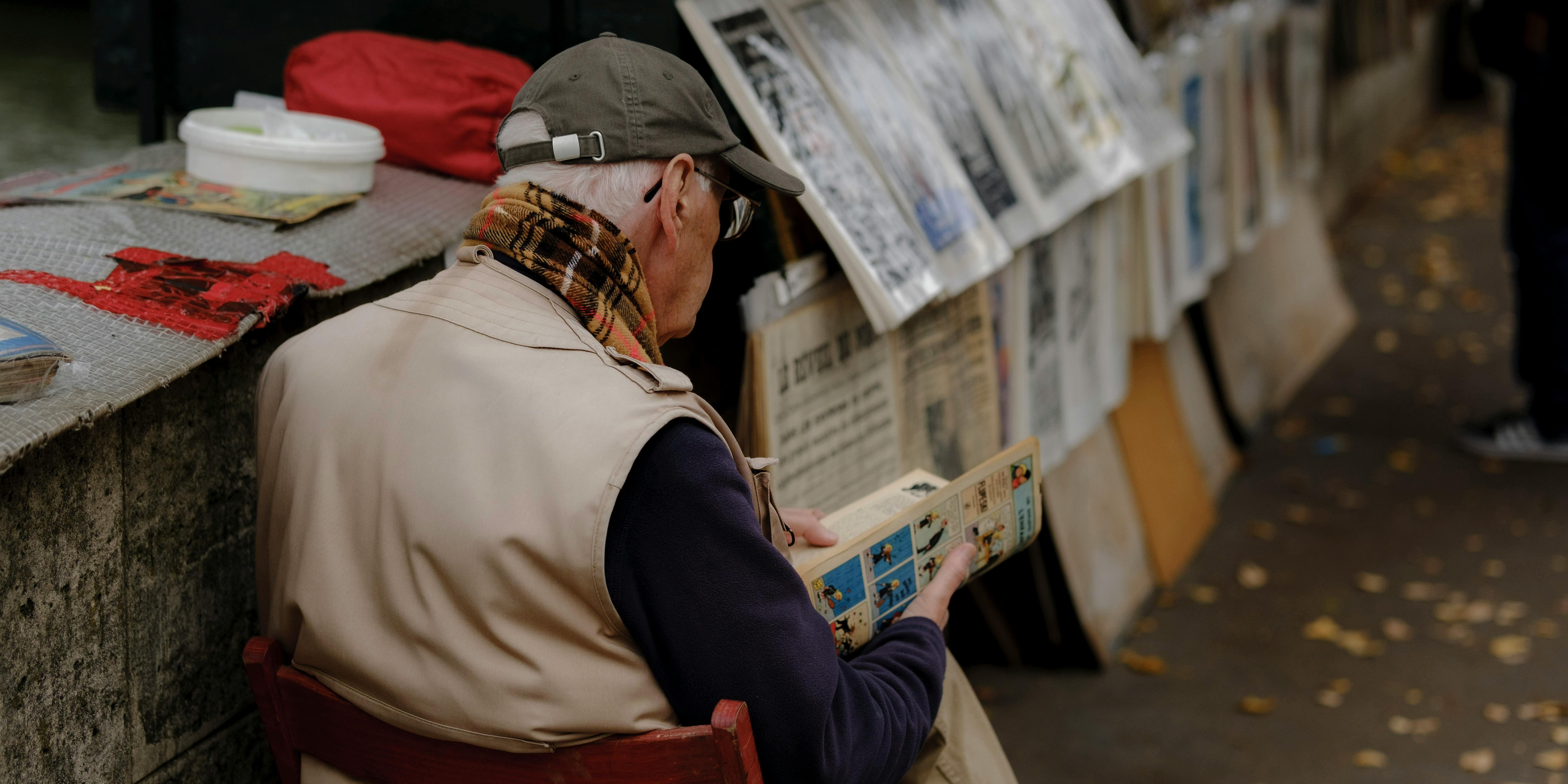 a man reading a newspaper