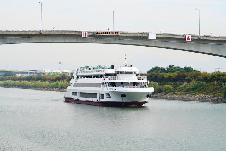 White Cruise Ship Cruising On Waterway