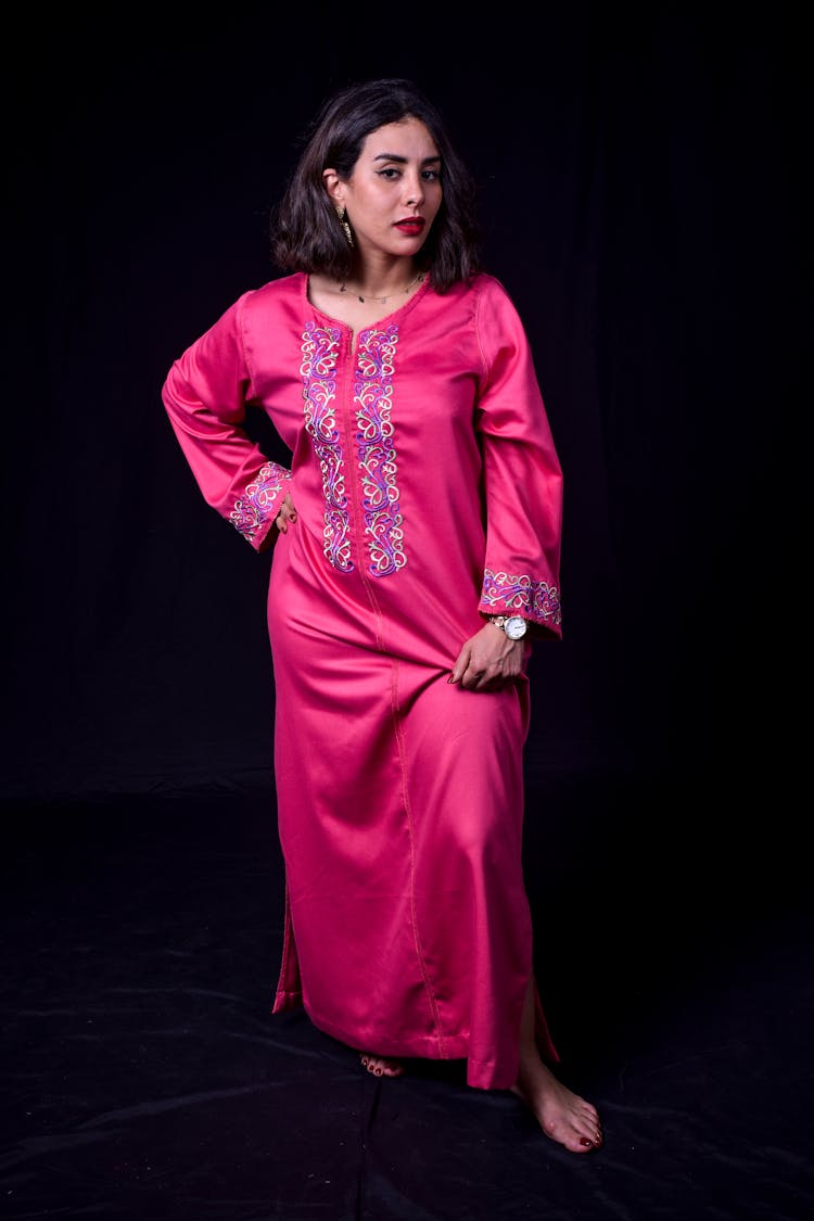 Woman Wearing A Traditional Pink Dress