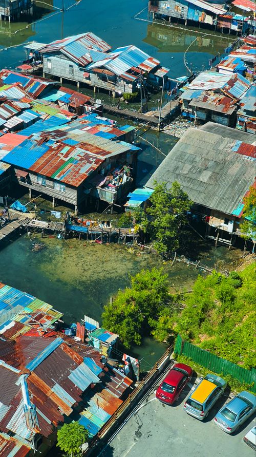 Free Bird's eye view of colorful waterfront houses in Kota Kinabalu, Sabah, Malaysia. Stock Photo