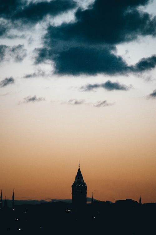 arkadan aydınlatılmış, Buda, bulutlar içeren Ücretsiz stok fotoğraf