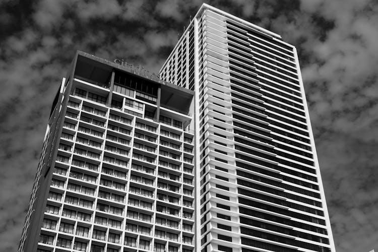 Grayscale Photo Of High Rise Building