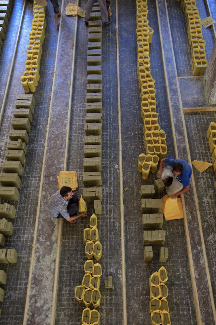 Men Working At Brick Factory