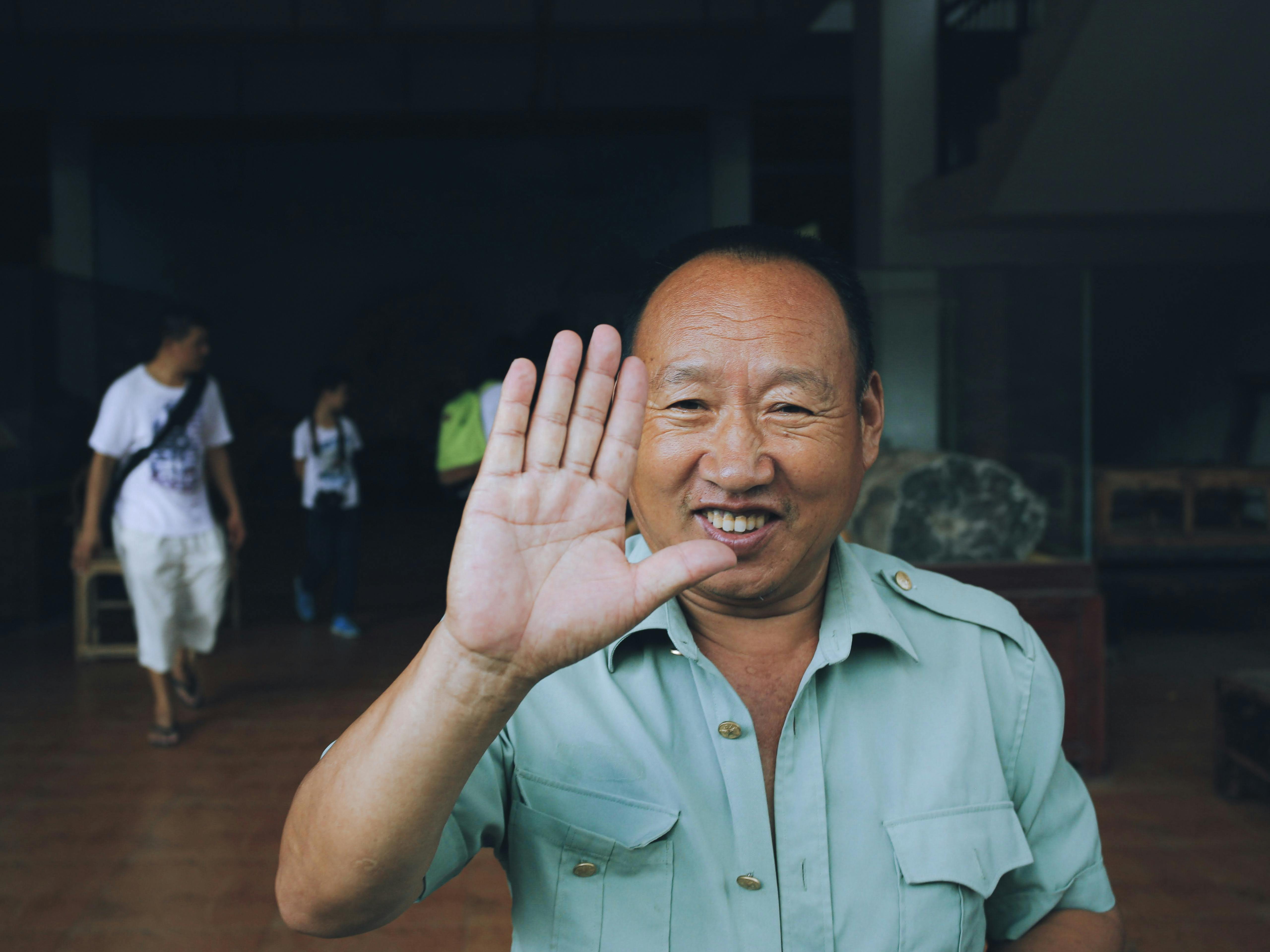 A Man in Green ButtonUp Shirt · Free Stock Photo