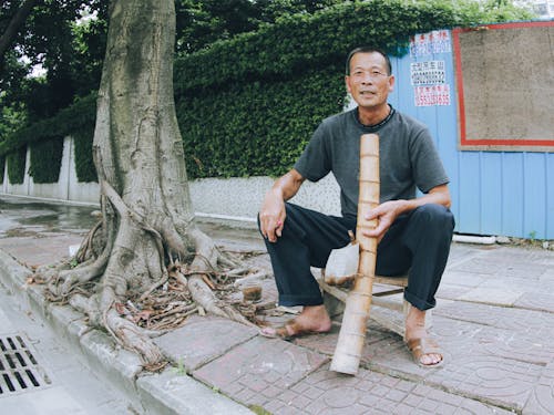 Photos gratuites de citadin, être assis, homme asiatique