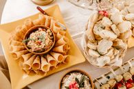 A delectable presentation of appetizers with spreads, perfect for gatherings or parties.