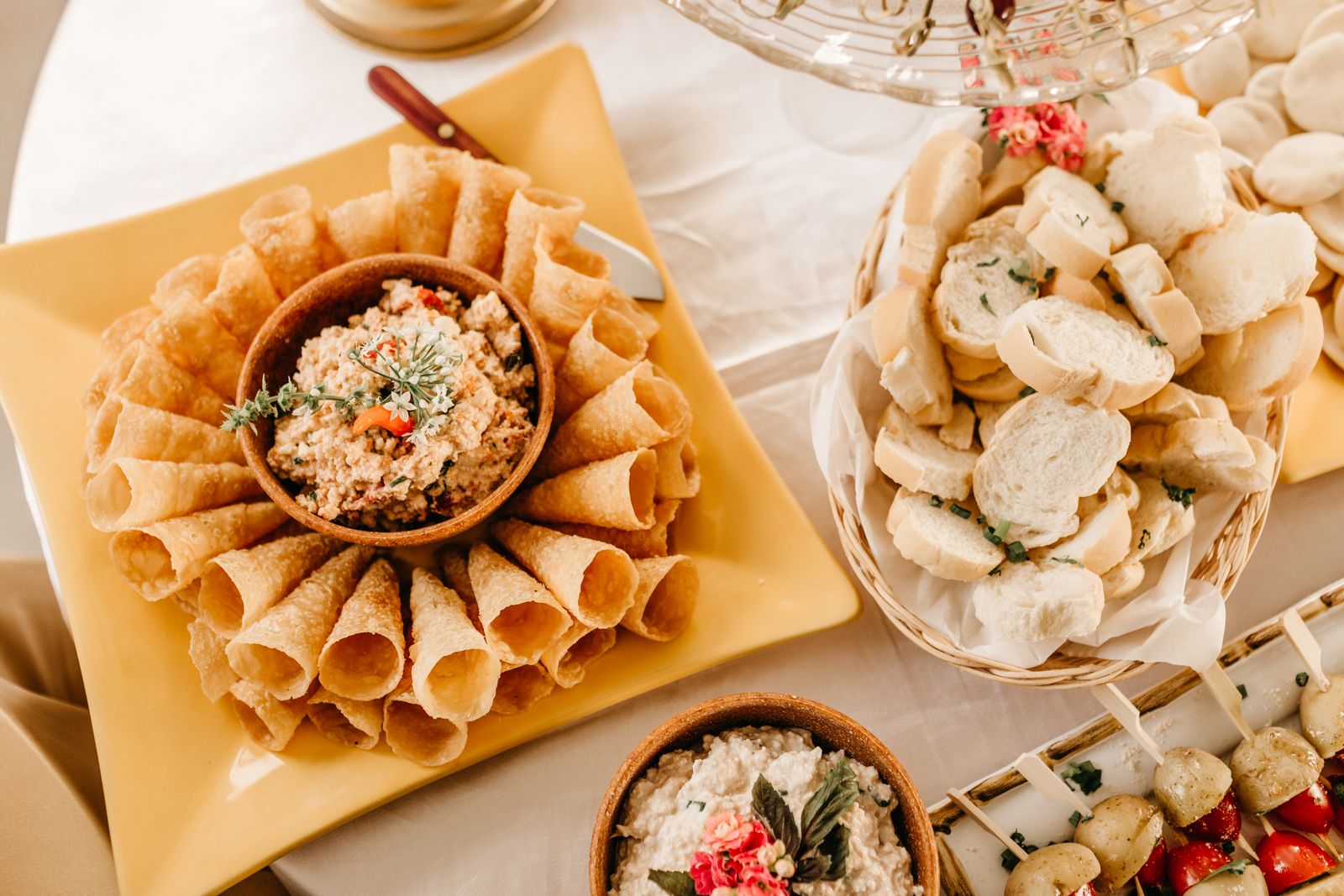 A delectable presentation of appetizers with spreads, perfect for gatherings or parties.