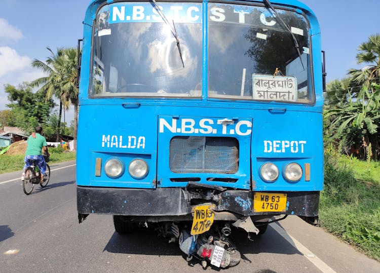 Blue And White Bus On Road