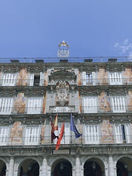 Historic Casa de la Panadería with vibrant frescoes at Plaza Mayor, Madrid.