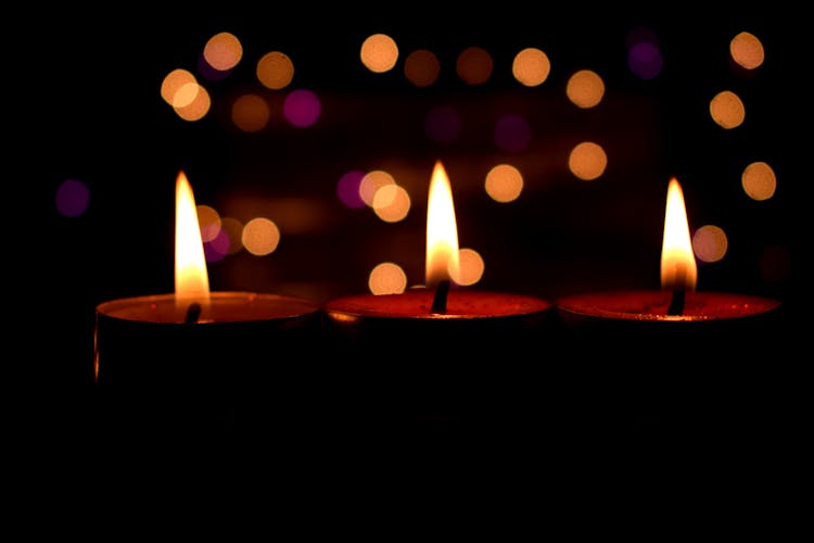 Close-up Photo Of Lighted Candles