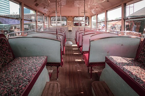 Seats and Handrails Inside a Public Bus
