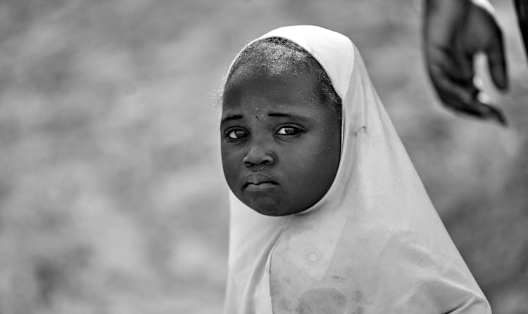 Portrait Of Girl Wearing Headscarf