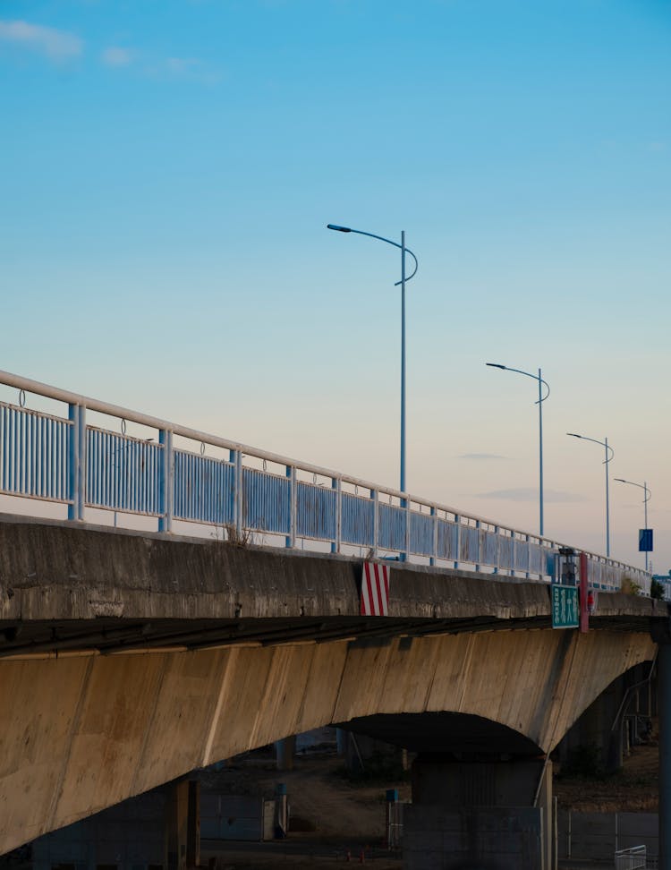 Streetlamps On A Concrete Bridge