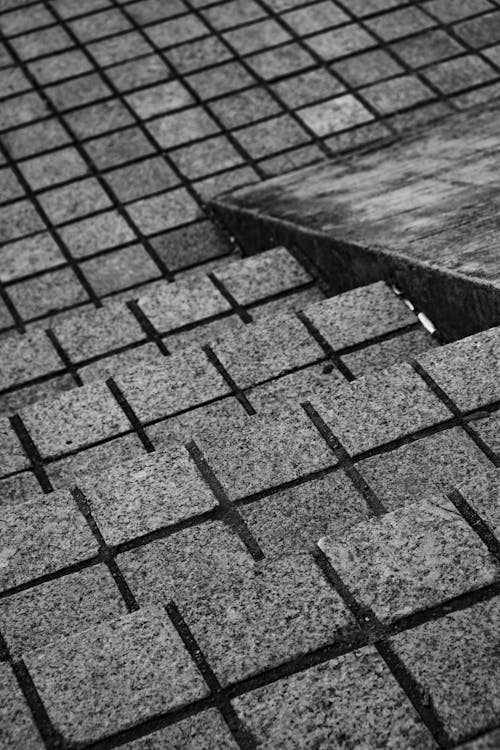 A Grayscale Photo of a Concrete Stairs