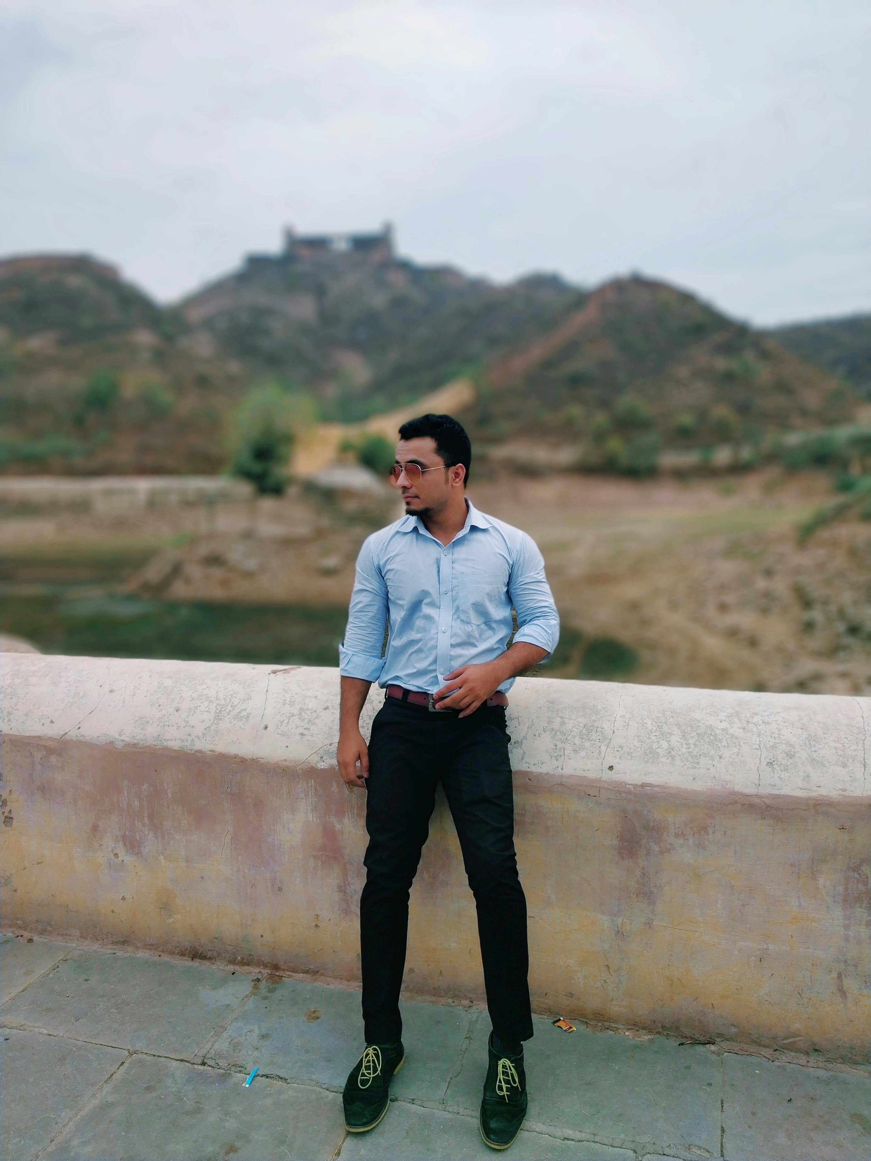 View of a professional tennis stadium from the stands during a night match