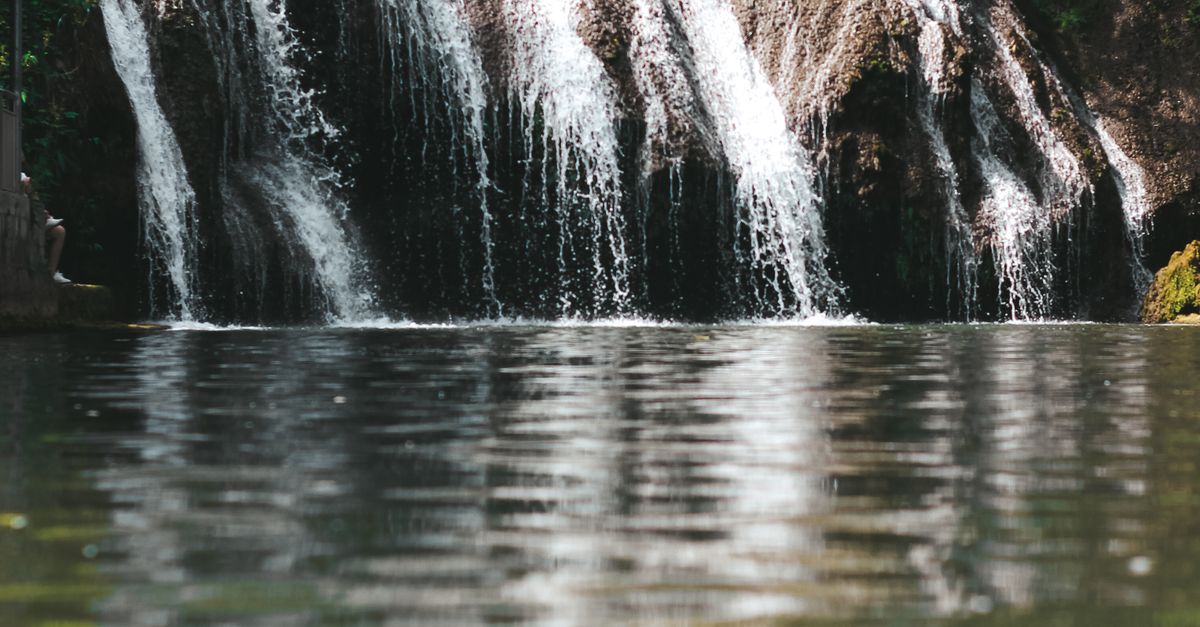 Waterfalls on Rock · Free Stock Photo