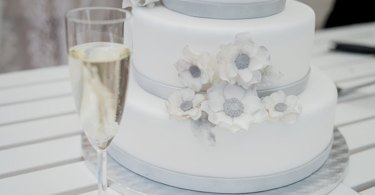 White Fondant Icings And Champagne Flute Glass