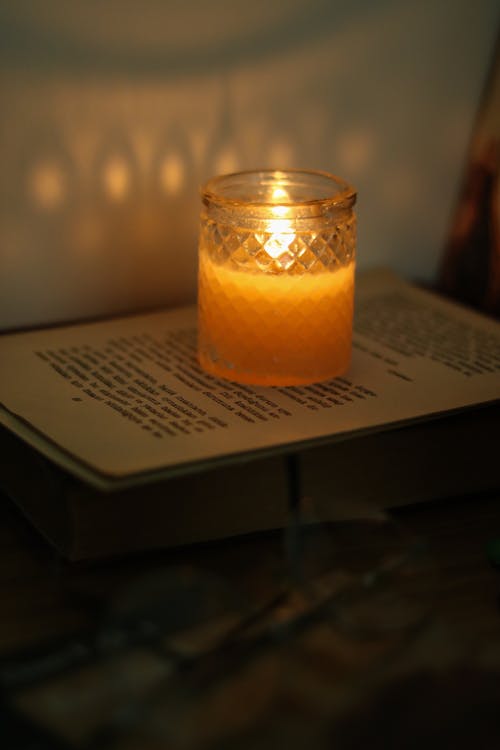 A Glass of Candle on the Book