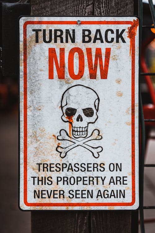 Close Up Photo of a Warning Sign 