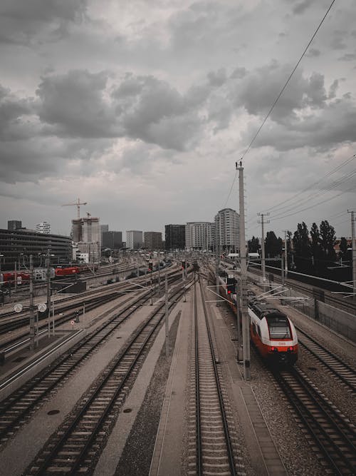 High Angle View of Railway Tracks and a Passenger Train 