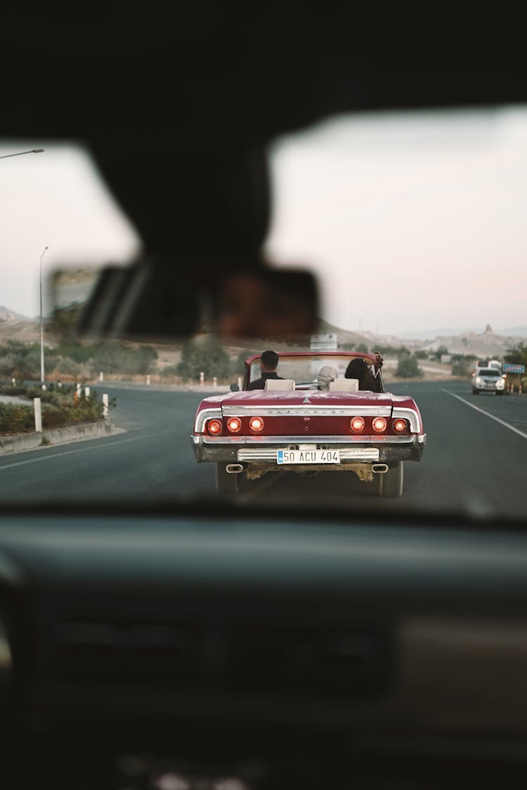 View From Windshield On Retro Car On Road