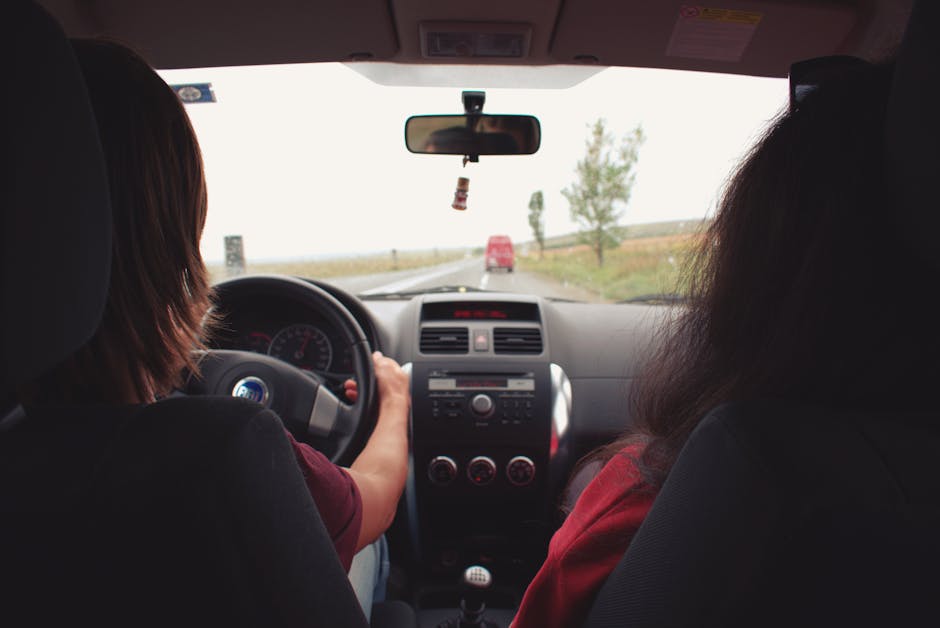 family driving car on highway safely