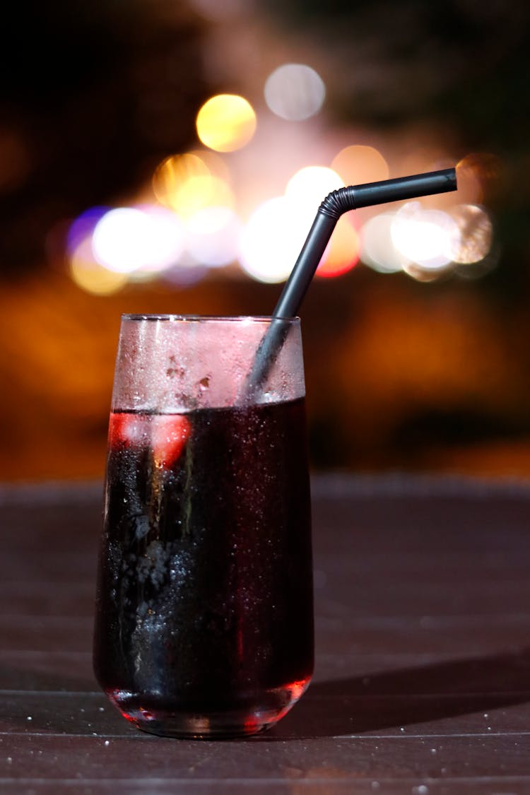 Close Up Of A Drink With A Straw 