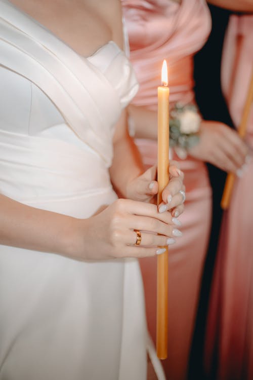 Woman Hands Holding Candle