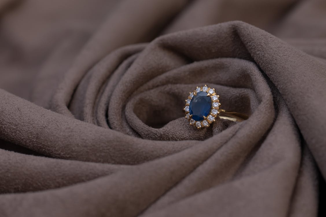Free Gold Ring with Sapphire and Diamond Stones Stock Photo