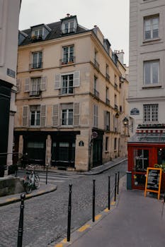 Quaint Parisian street with classic architecture, a perfect urban travel scene.