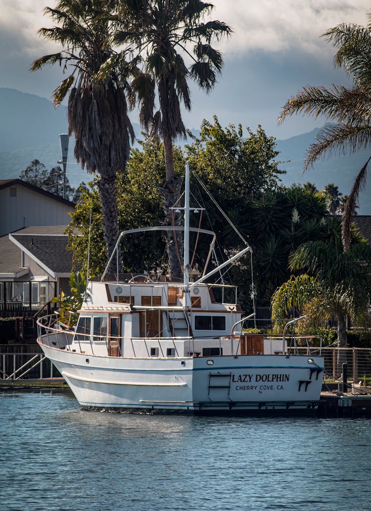 White Boat On Dock