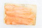 Sliced cured fish on a platter. Photo by Deane Bayas on Pexels.