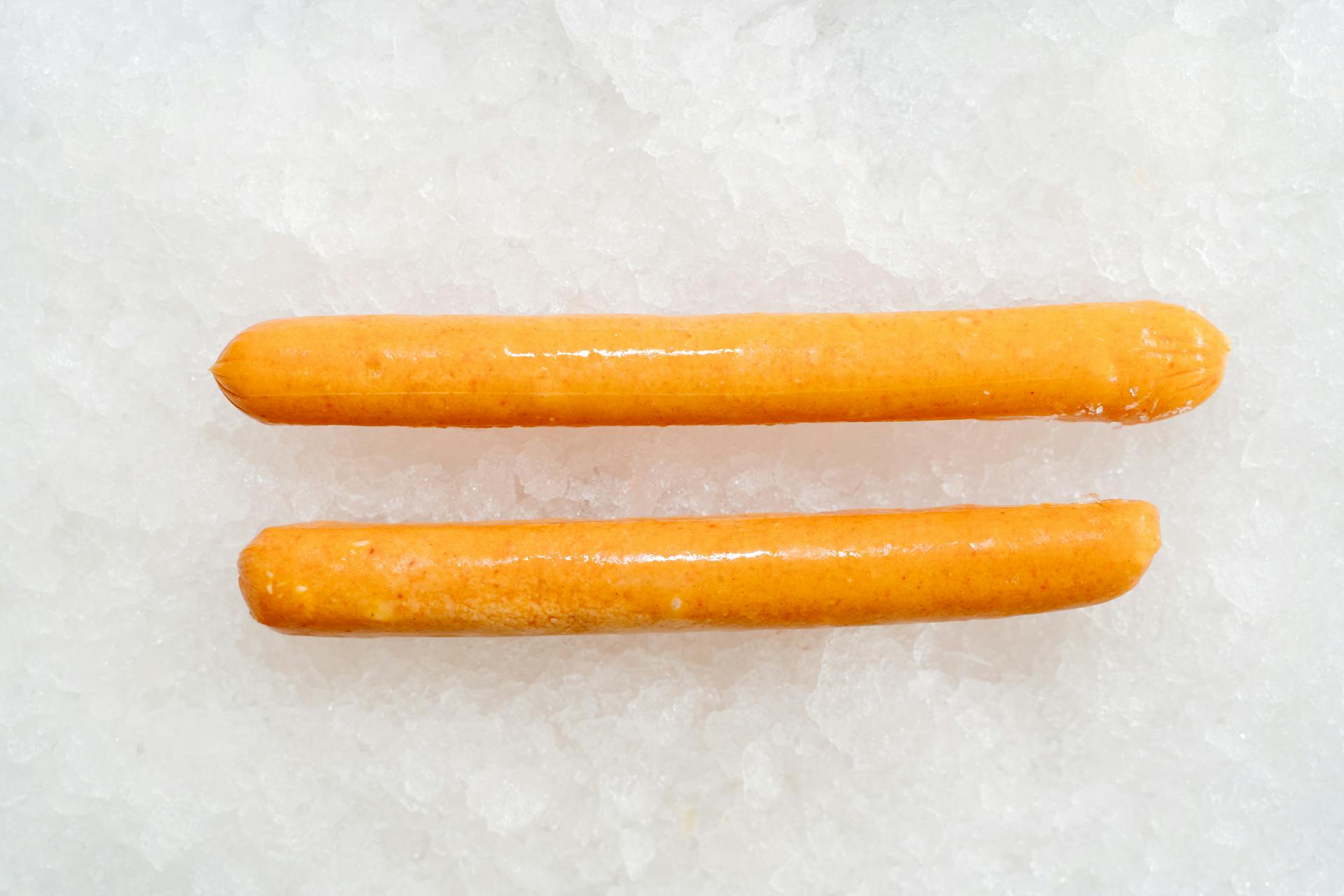 Close Up of Hot Dogs on Ice