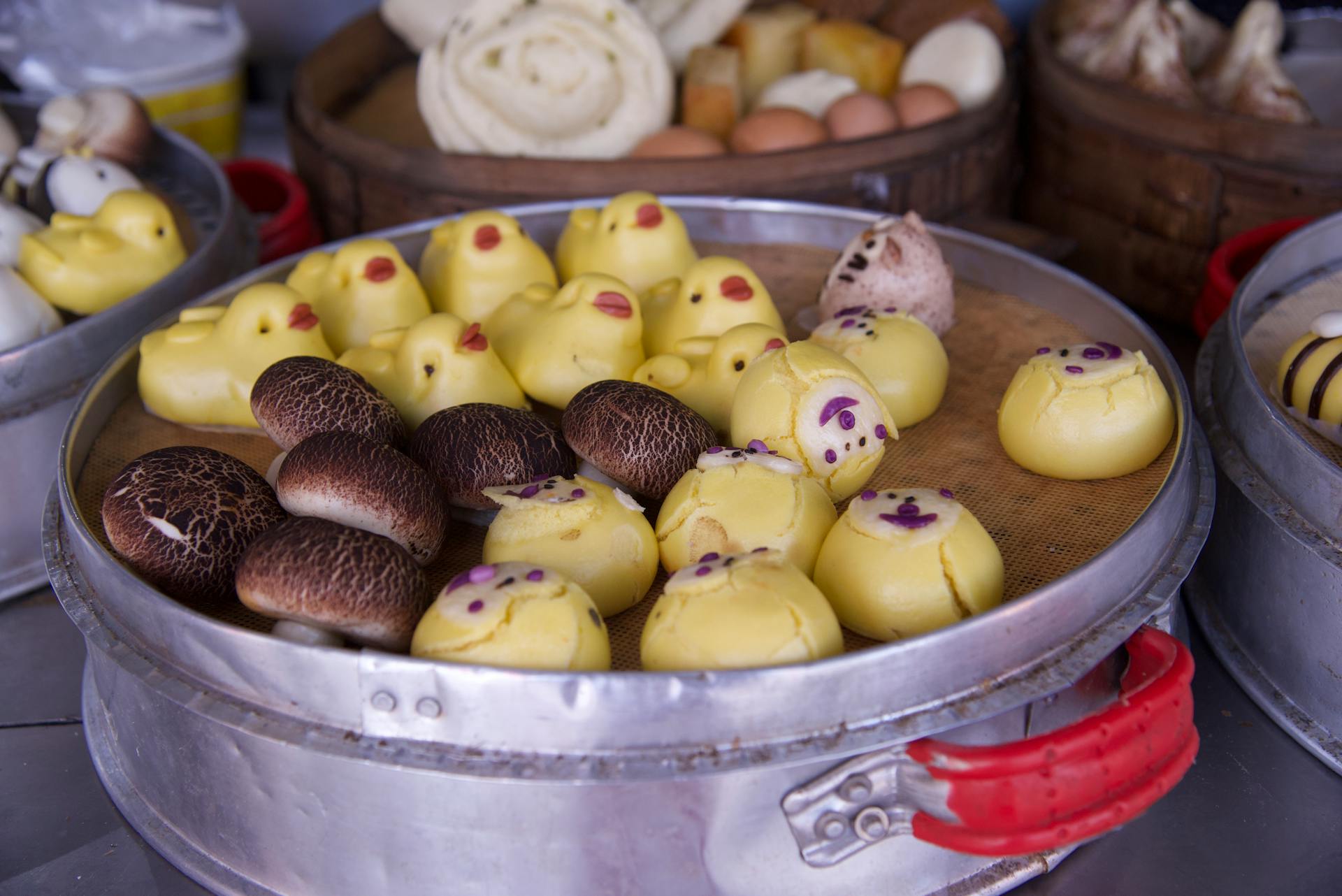 Dim Sum and Mushrooms on Metal Steamer