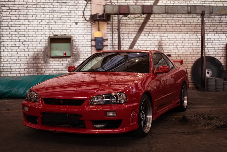 Red Car Parked In A Garage