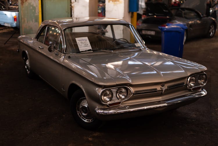 Chevy Corvair Car Parked In A Garage