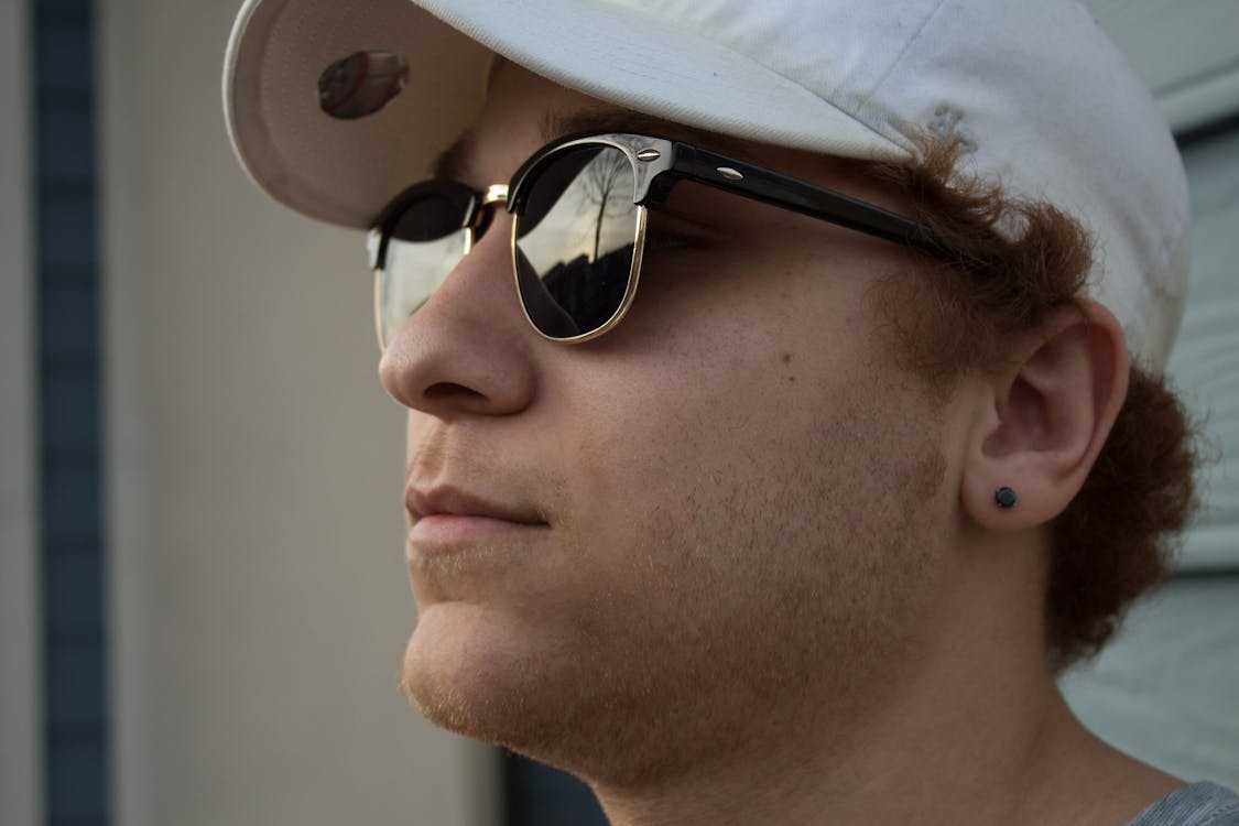 Close-up Photo of Man in Black Ray-ban Sunglasses and White Hat · Free Stock  Photo