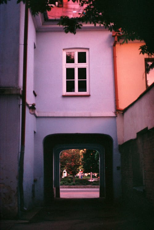 Blue Building in Alley in Town