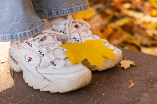 Yellow Maple Leaf on White Sneakers