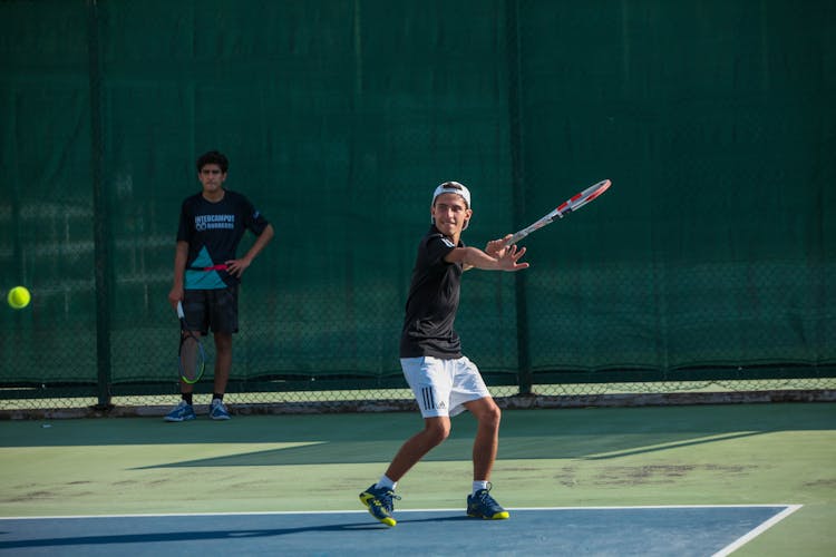  A Man Playing Tennis