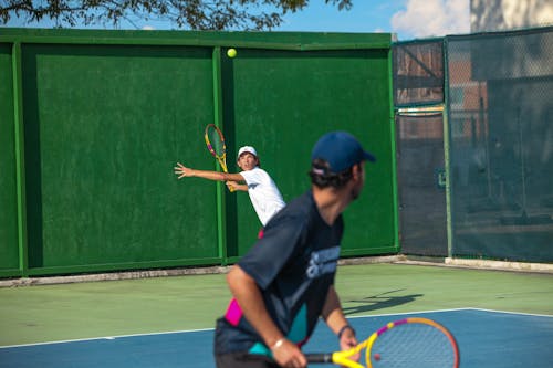 Men Playing Tennis