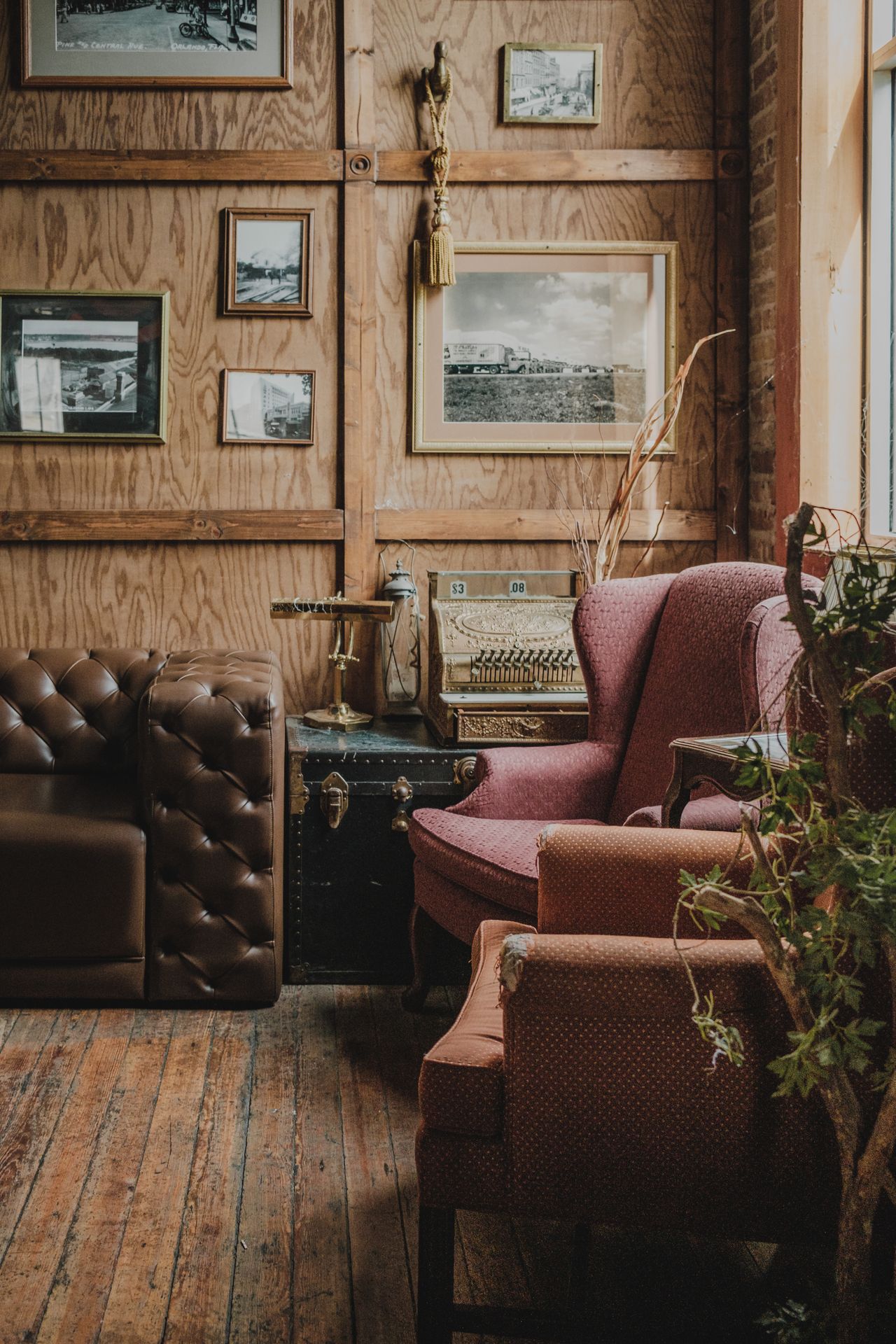 Pink armchair in a warm vintage living room