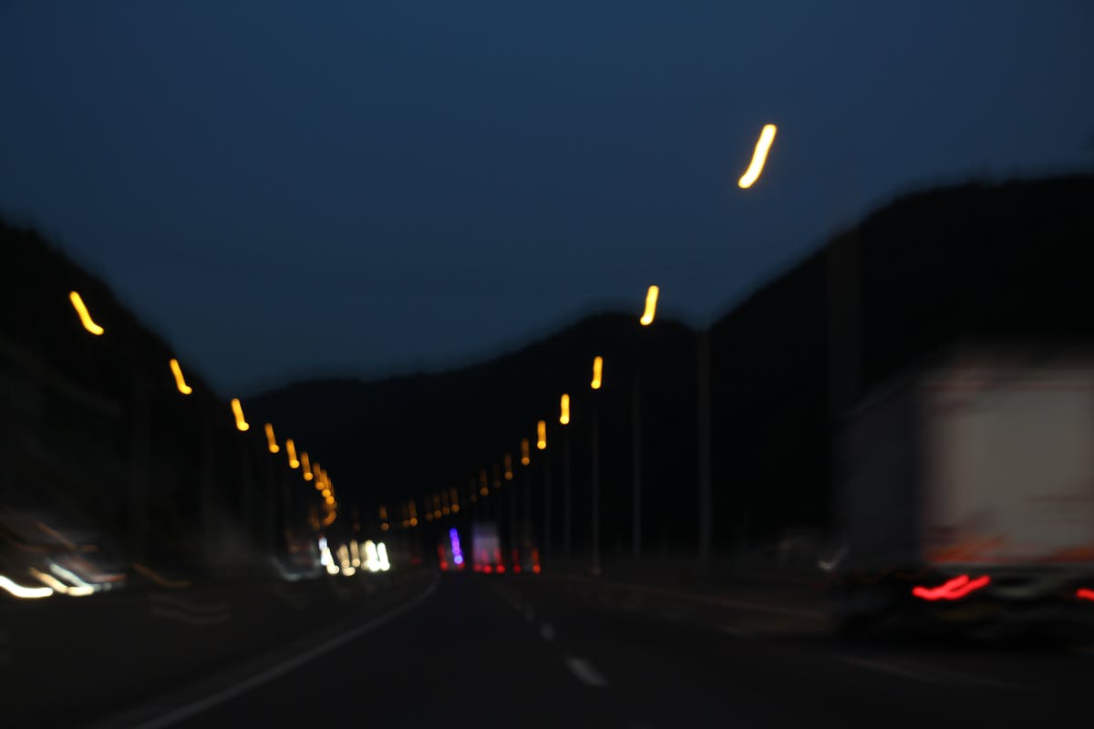 Wide aerial view of a modern motorsport circuit with sweeping corners