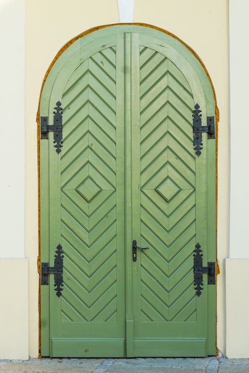 Green Old Wooden Doors to Building
