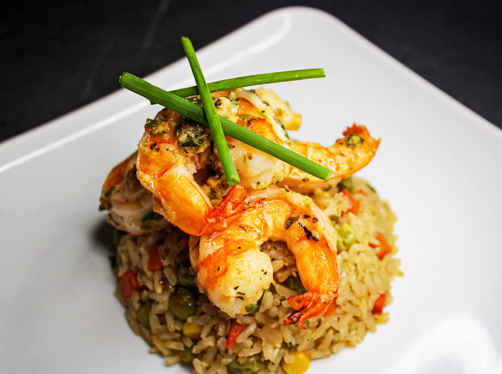 Delicious cooked Cajun shrimp and rice ready to serve