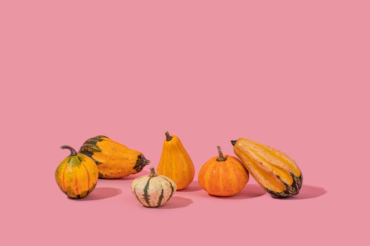 Photo Of Squashes On Pink Surface