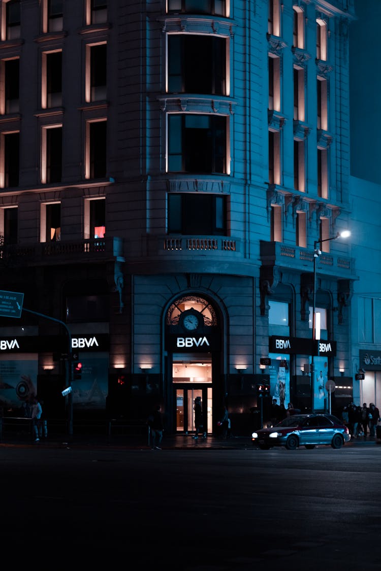 Illuminated Corner Building At Night