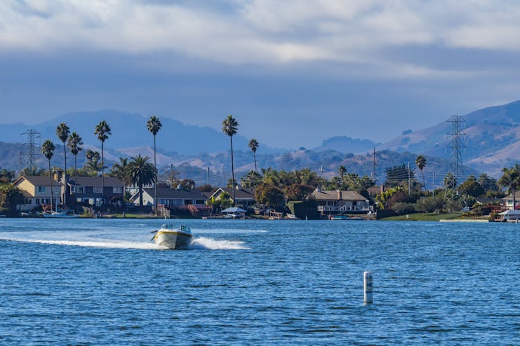 A Motorboat Sailing On The River