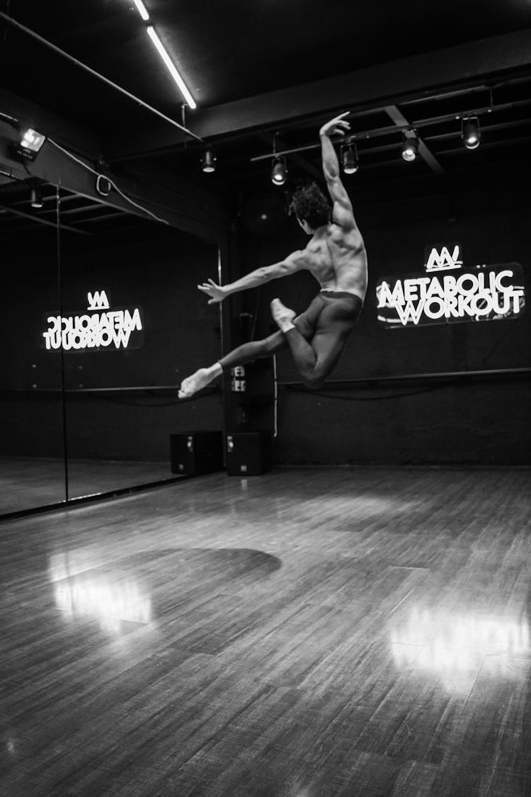 A Man Dancing In A Studio